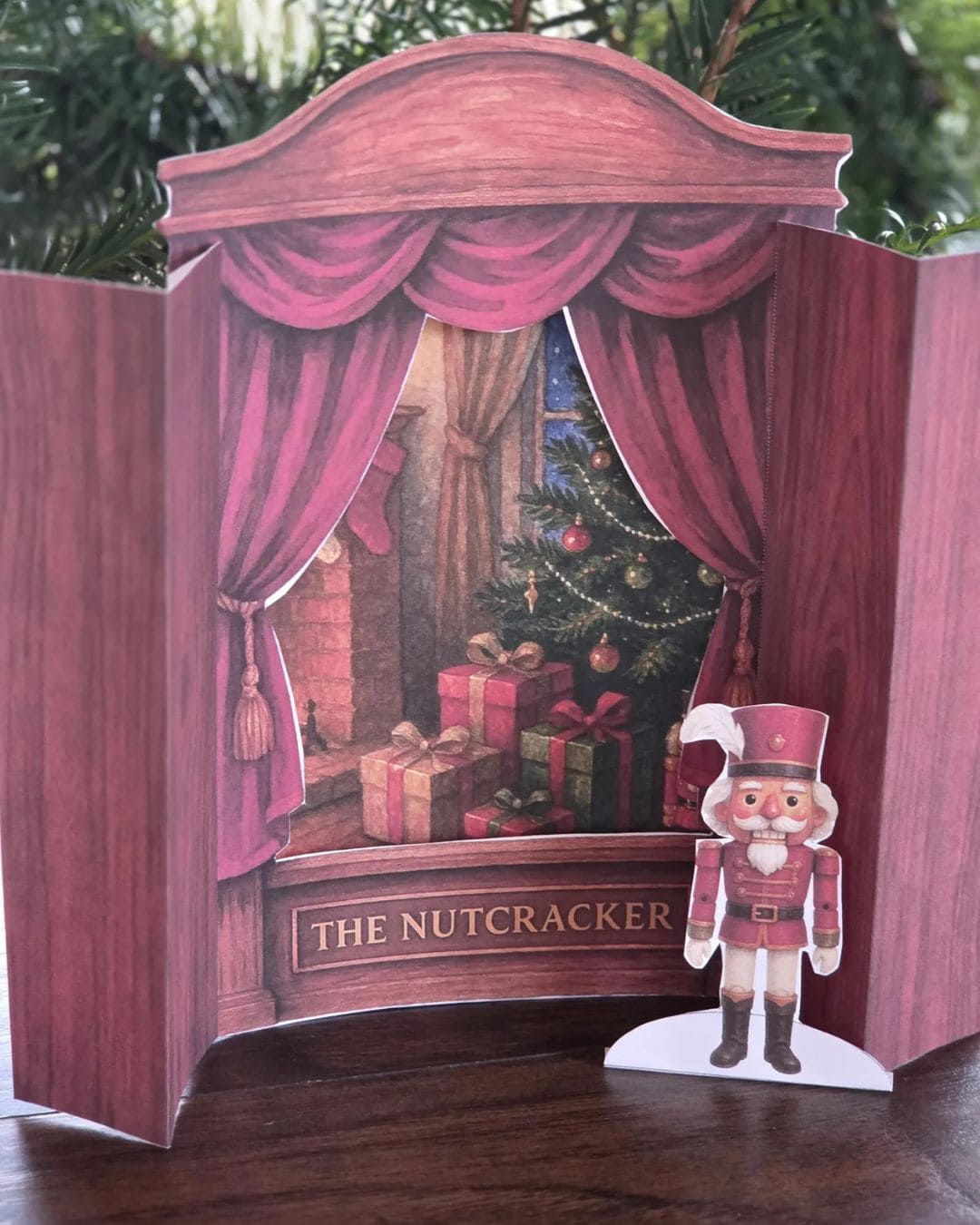 Pop-up theater set with 'The Nutcracker' book study theme, featuring a Nutcracker figure and Christmas scene.