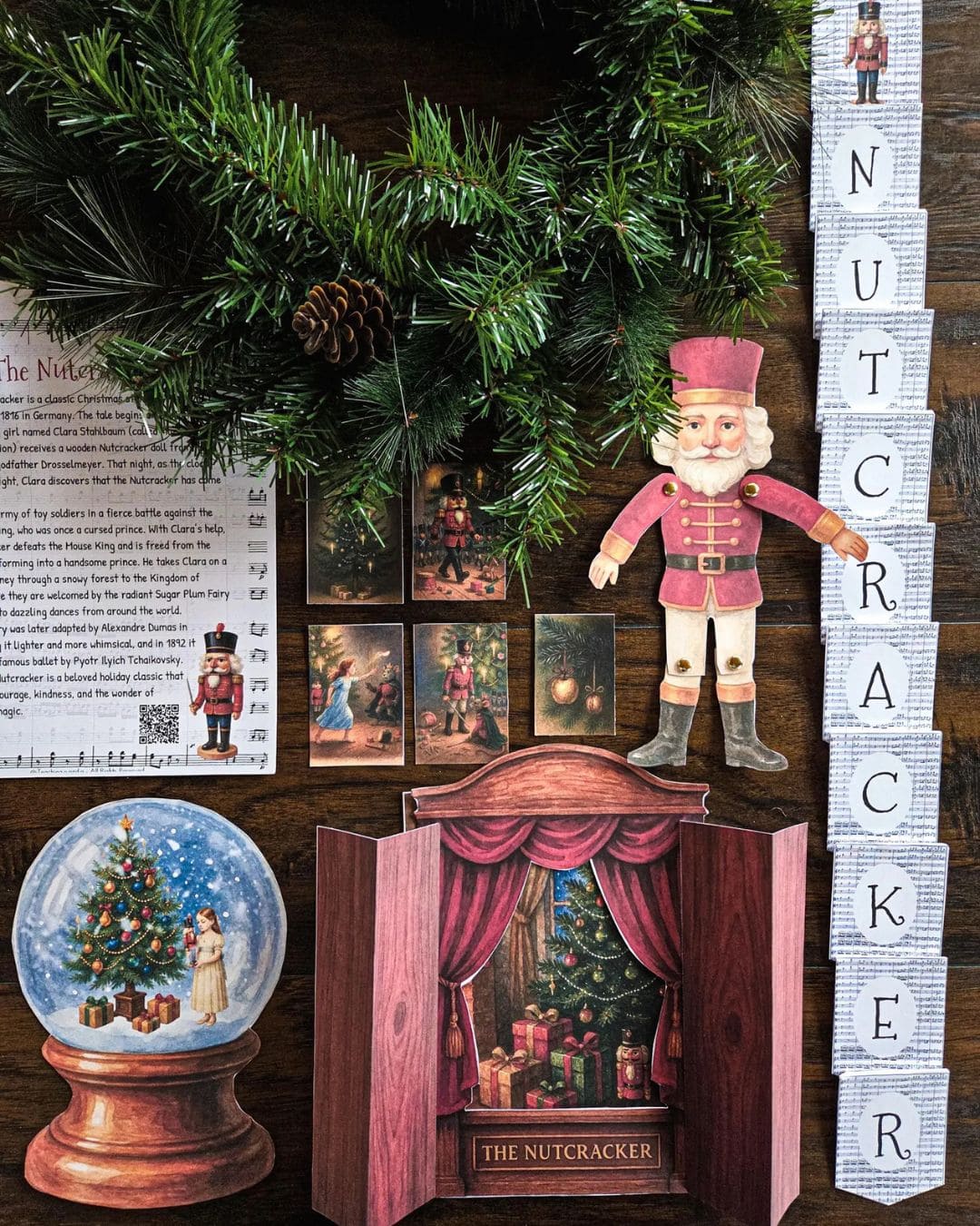 Nutcracker Book Study decorative Nutcracker scene with a snow globe and wooden box on a wooden background.