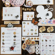 Spring activity book printable cover with watercolor flowers and birds